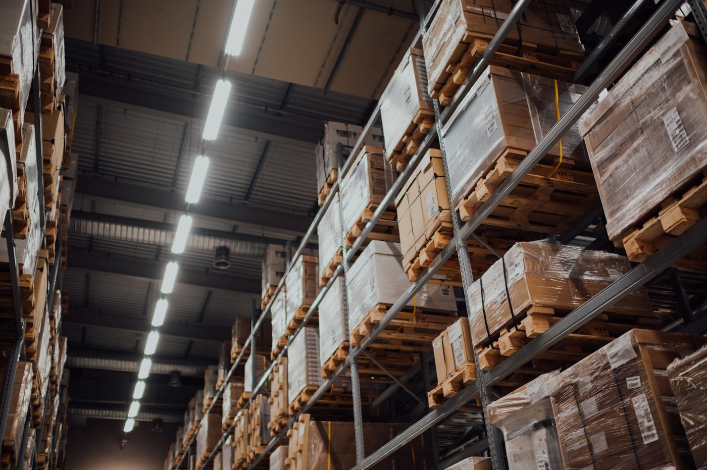 Palletized inventory stacked on warehouse racking